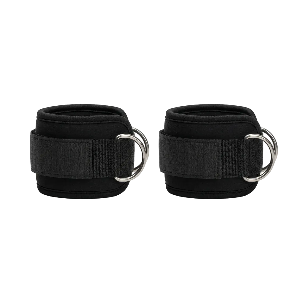 Pair of padded black ankle straps with D-rings for cable machines, studio product photo